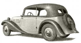 Druhý vyrobený vůz Praga Baby (1934) - pohled zezadu s detailem číslové tabulky a koncovou lampičkou skrz disk rezervy.
